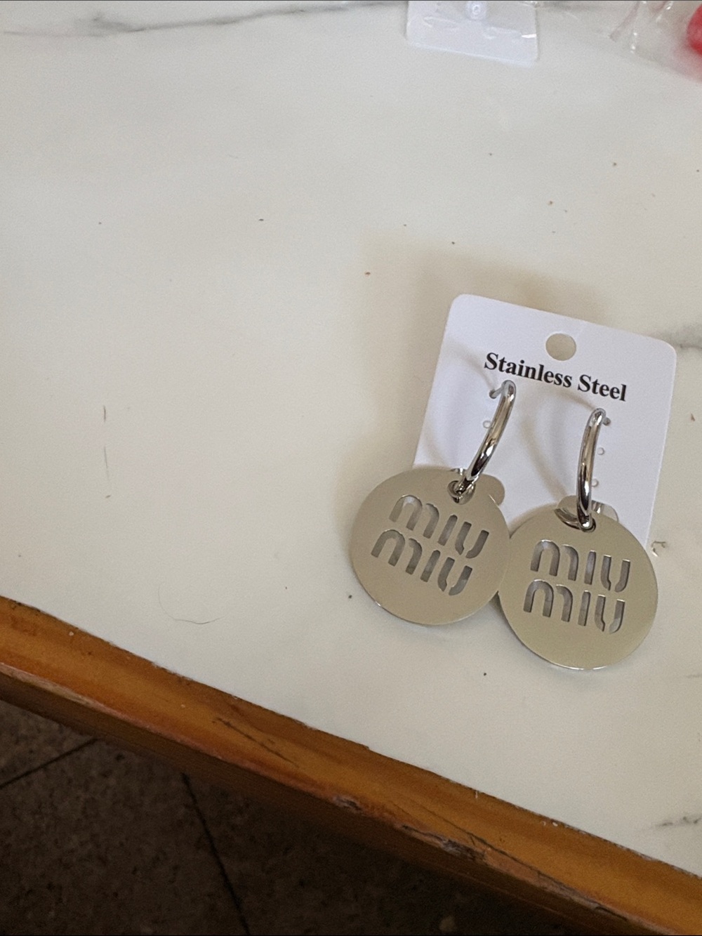 Miu Miu Silver Logo Disc Hoop Earrings